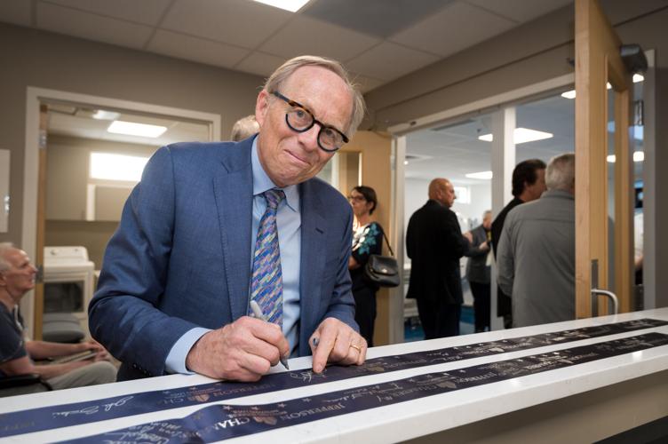 Paul Harch - HBOT scientist, signing something